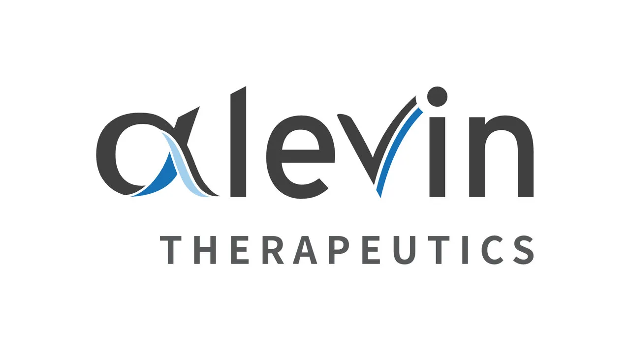 The final logo: a charcoal alpha with two blue swooshes, levin in charcoal and THERAPEUTICS spaced out underneath