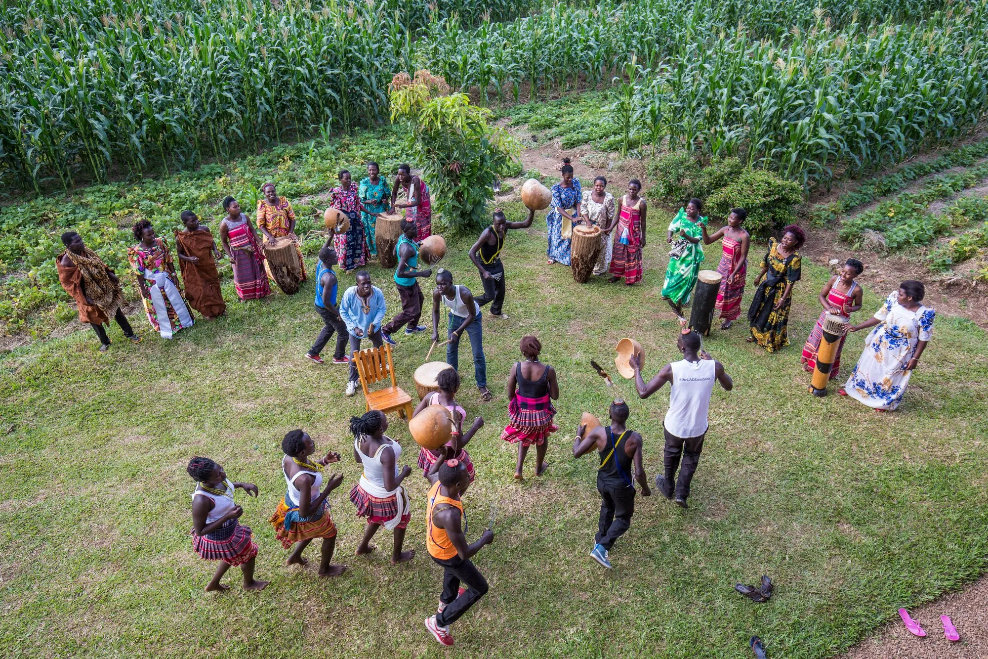 Dancing in a circle on the lawn at Kira Farm, seen from above