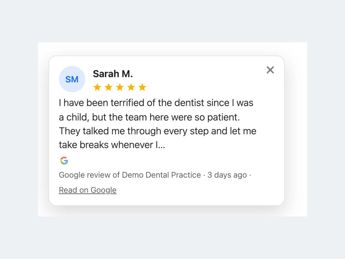The pop-up review card: initials, name, five stars, the review, and Read on Google