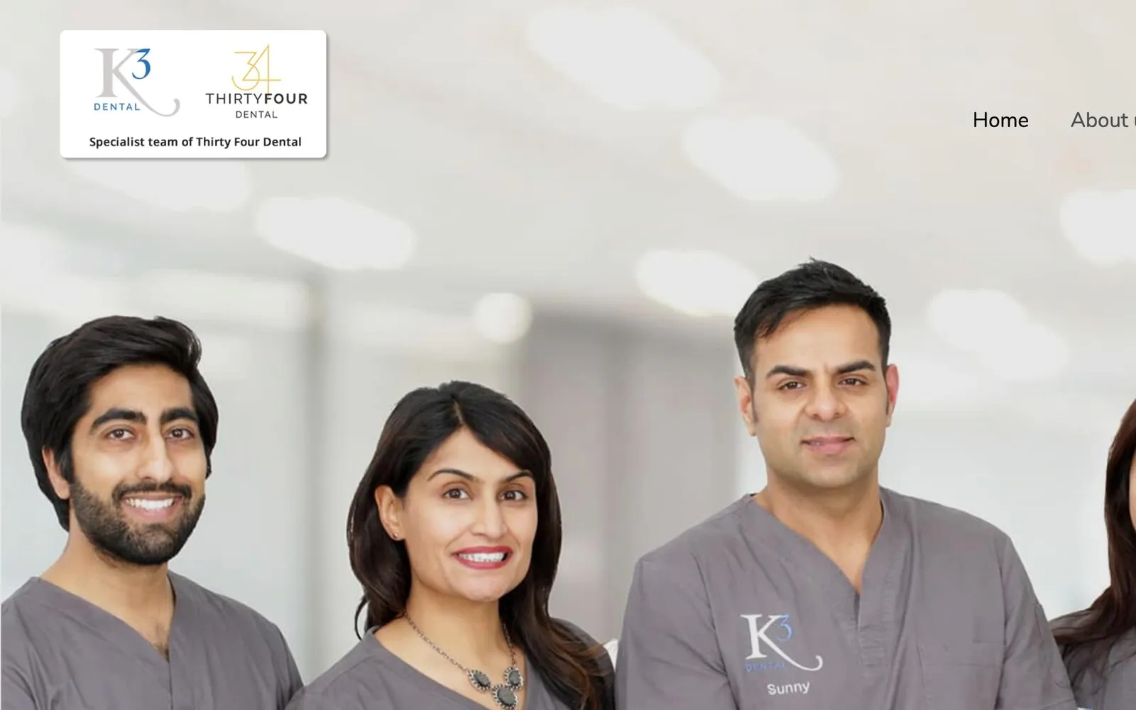 K3 Dental’s home page: the K3 and Thirty Four Dental logos and the menu above the team in grey K3 scrubs