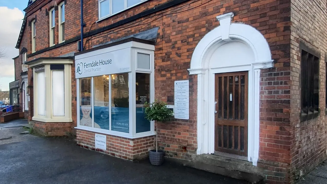 90 Saltergate from the street: a red-brick house with a bay window and the practice sign