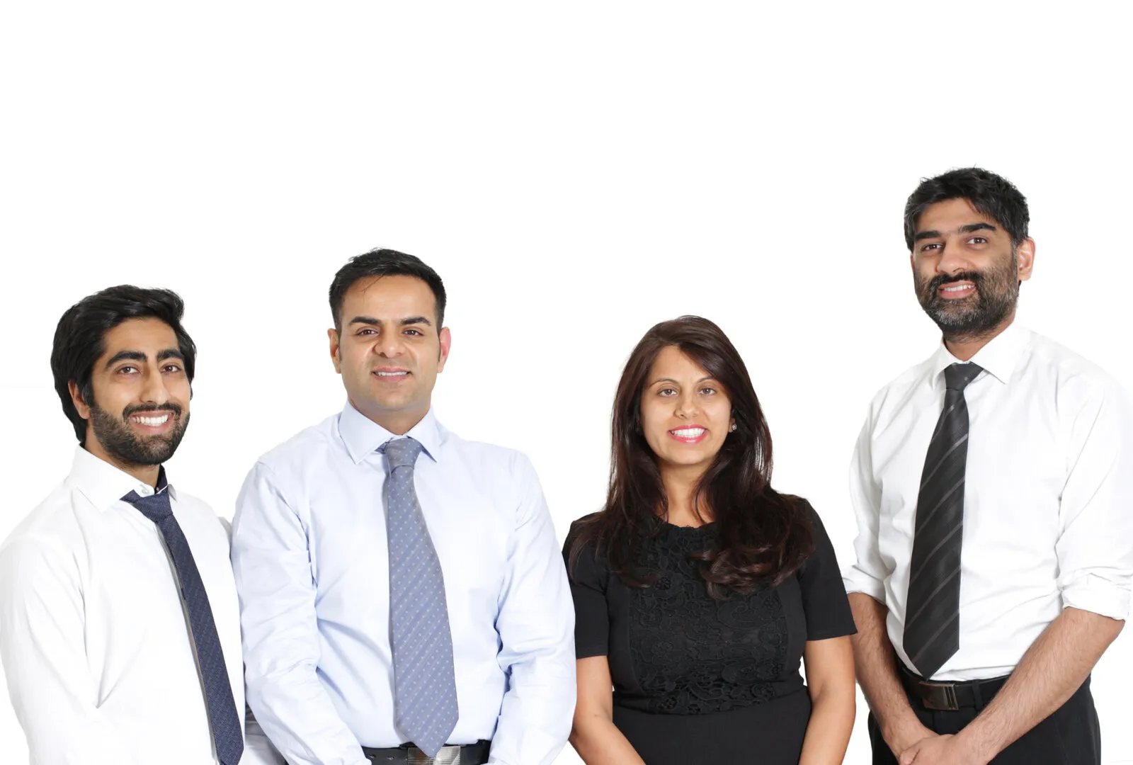 Viren, Sunny, Sheena and Daniel in shirts and ties and a black dress, photographed on a plain white studio background