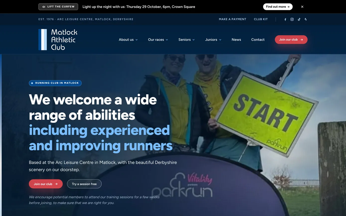 The Matlock Athletic Club homepage on a desktop browser: “We welcome a wide range of abilities including experienced and improving runners” over a photo of runners passing a parkrun start sign