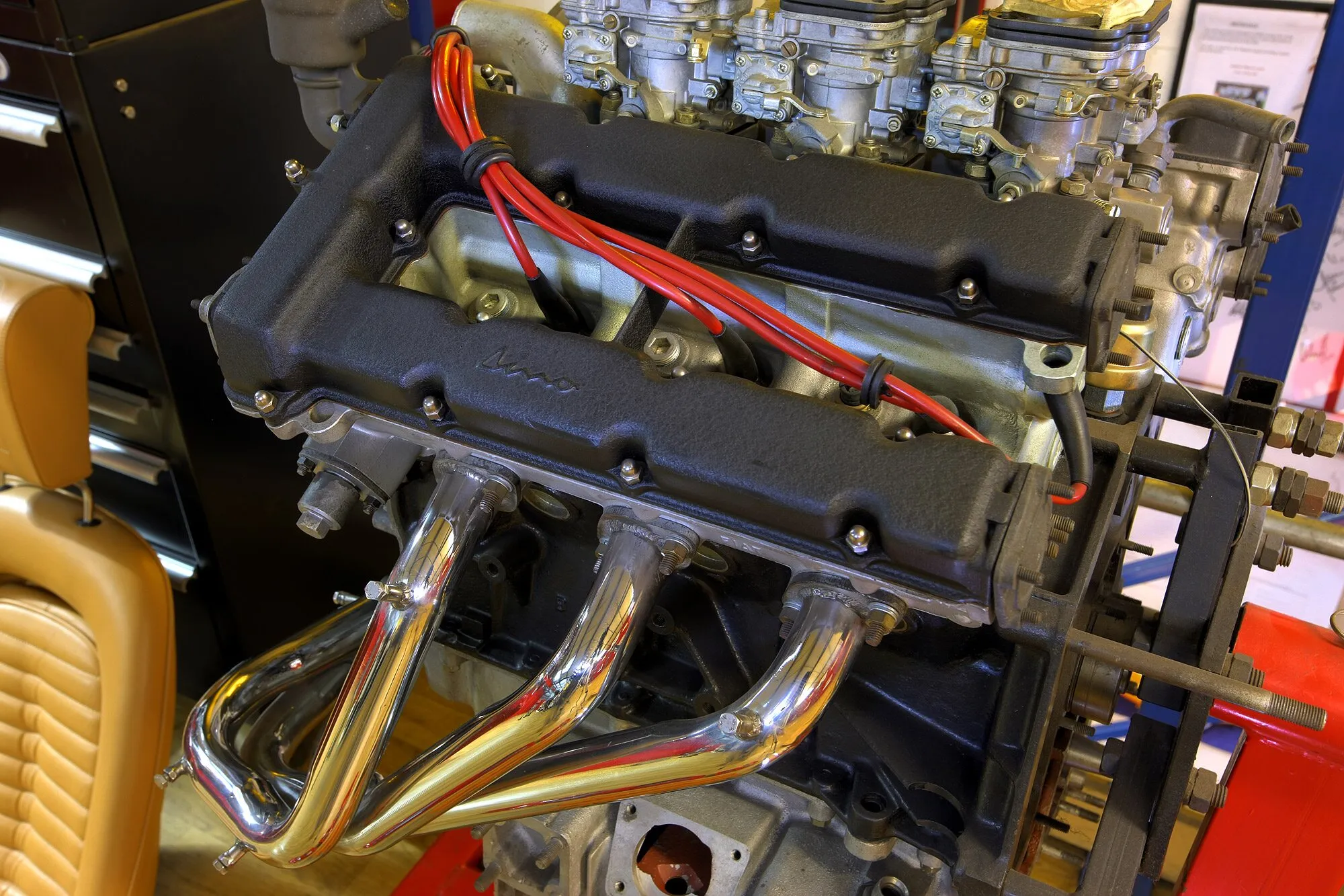 A Dino V6 engine with Weber carburettors and new exhaust headers
