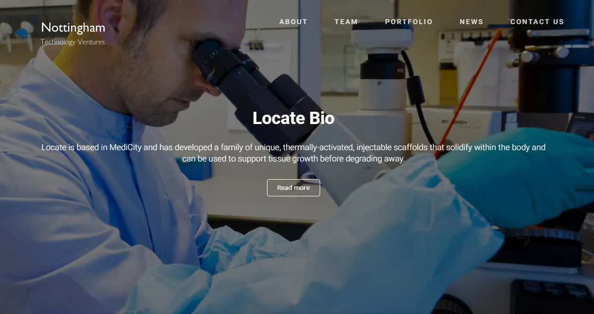 Our first design, November 2018: a full-width photo of a scientist at a microscope with “Locate Bio” over it, the company’s name in plain type at the top left, and a menu of About, Team, Portfolio, News and Contact us