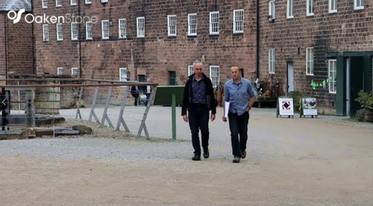 OakenStone’s two directors walking across the yard at Cromford Mills
