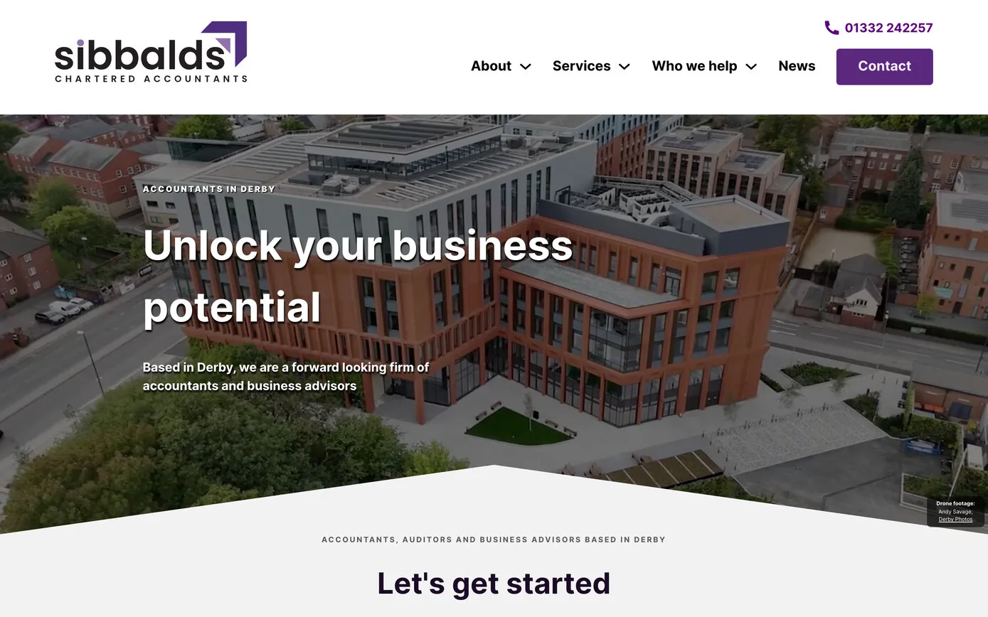 The Sibbalds homepage on a desktop browser: the purple arrow logo in white above “Unlock your business potential”, over an aerial view of Derby