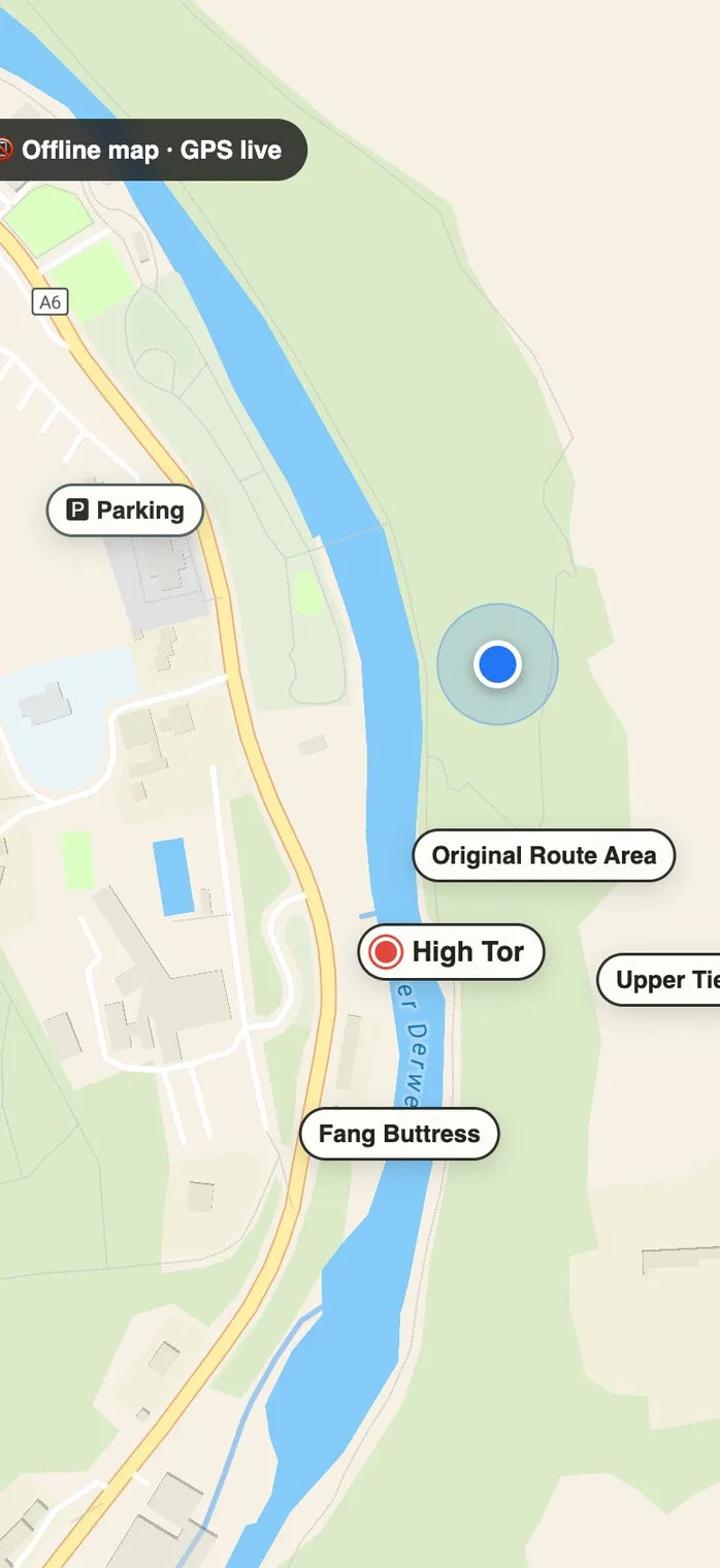 A crag map on a phone labelled Offline map, GPS live: a river valley with footpaths, the blue you are here dot, pins for High Tor, Original Route Area, Upper Tier and Fang Buttress, and a Parking pin