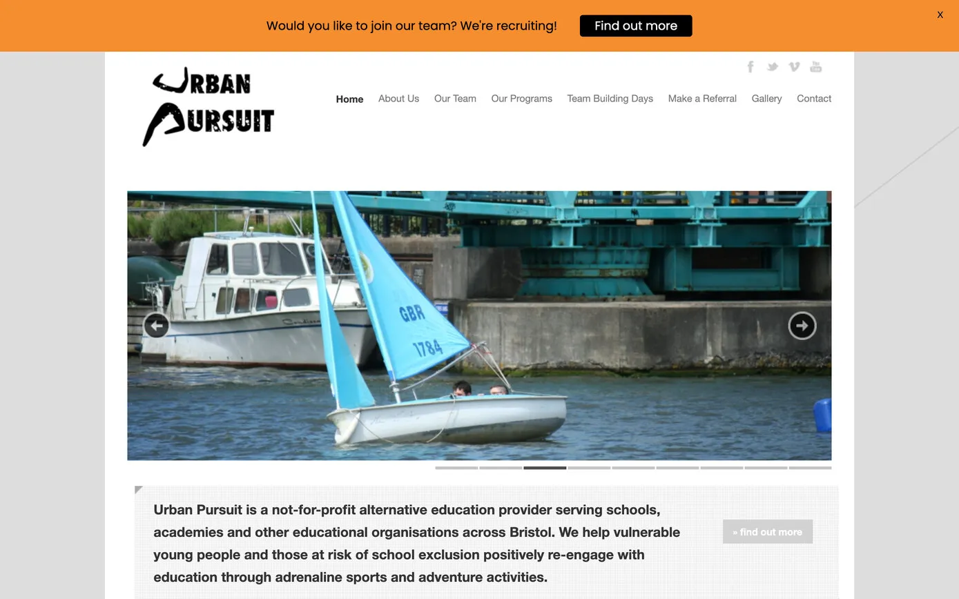 urbanpursuit.co.uk in April 2022: the black hand-drawn logo, a photo of a dinghy on Bristol harbour, and an orange “We’re recruiting!” notice along the top