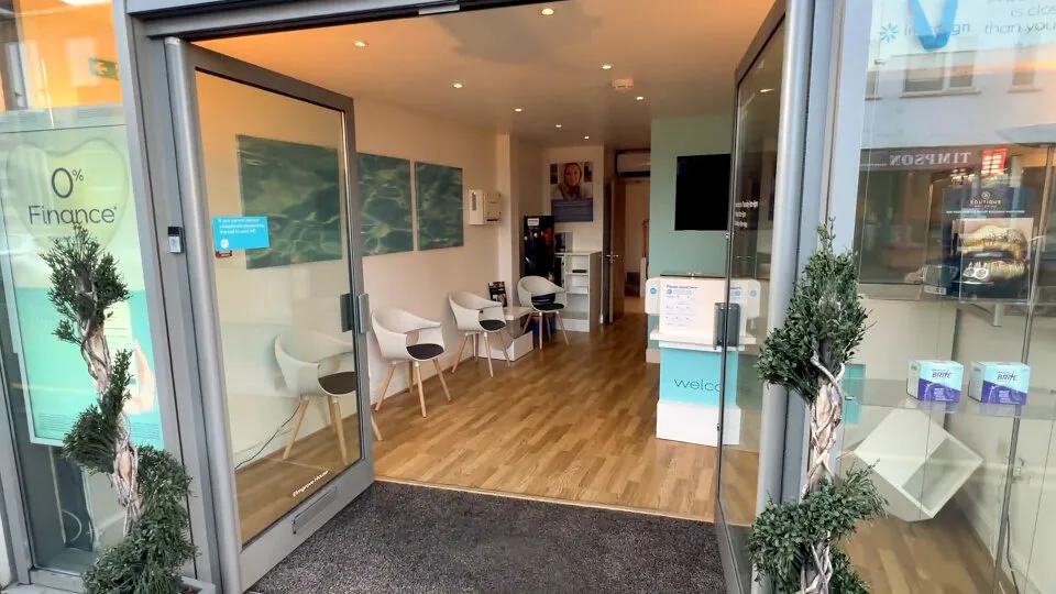 Looking through the glass doors into reception