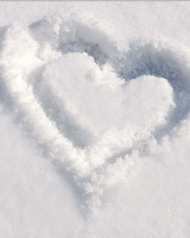 A heart drawn in snow
